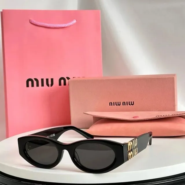 Miu Miu Oval Sunglasses Gold Logo Temples
