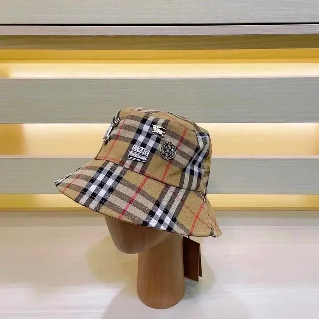 Burberry bucket hat Haymarket check with metal equestrian knight and 'CLIMATE' patch