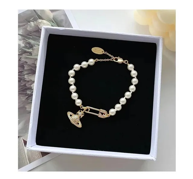 Vivienne Westwood Pearl Safety Pin Bracelet Gold-tone with Crystal Orb