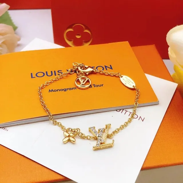 Louis Vuitton Monogram World Tour Bracelet LV Logo with Crystals and Flower Charm
