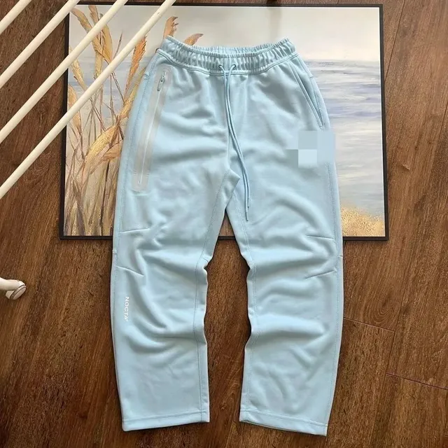 Nike × NOCTA Tech Fleece Joggers Light Blue