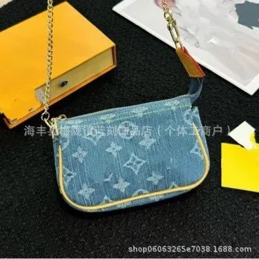 Louis Vuitton On The Go Pouch Monogram Denim
