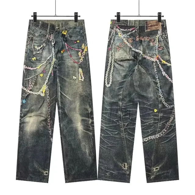 Denim Tears Chain-Embellished Jeans Distressed with Multi-Color Chains and Charms