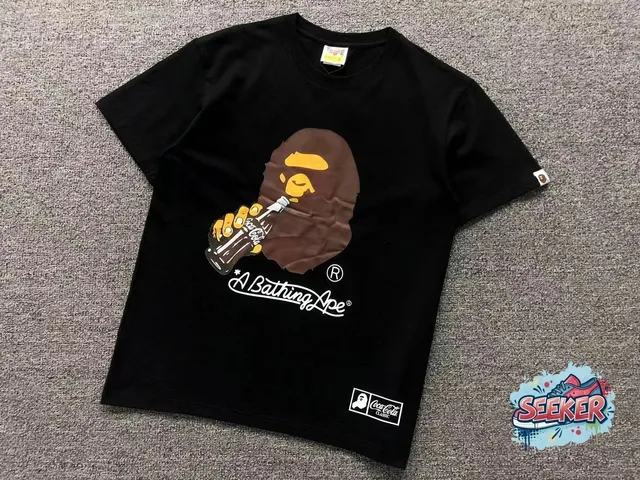 BAPE Coca-Cola Ape Tee Brown Ape Holding Coke Bottle