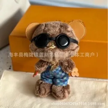Hermès Plush Bear Figurine Sunglasses and Denim Shorts