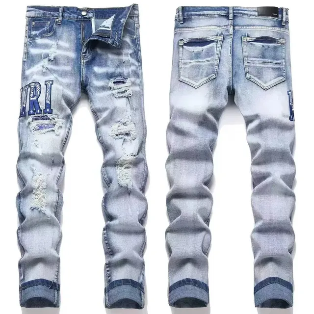 Amiri Distressed Jeans Logo Patch Ripped