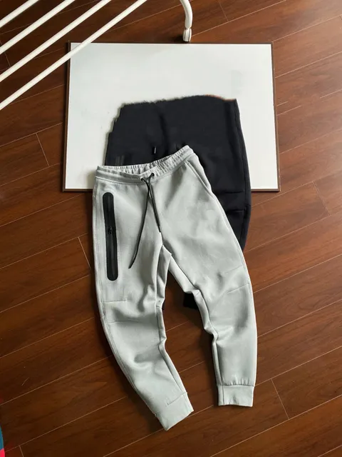 Nike Tech Fleece Joggers Light Grey with Black Zip Pocket