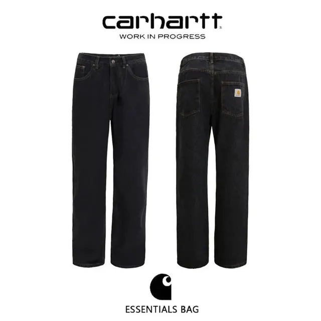 Carhartt WIP wide-leg jeans dark wash with orange label patch