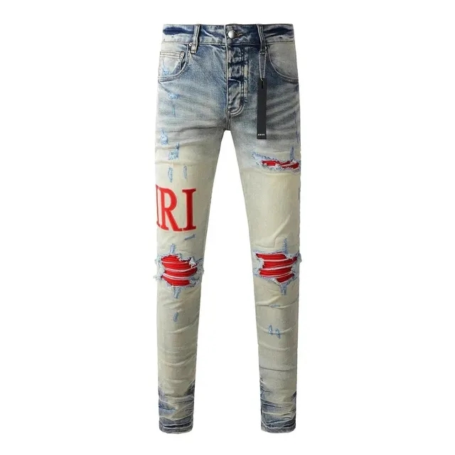 Amiri Distressed Slim Fit Jeans Red Logo Print