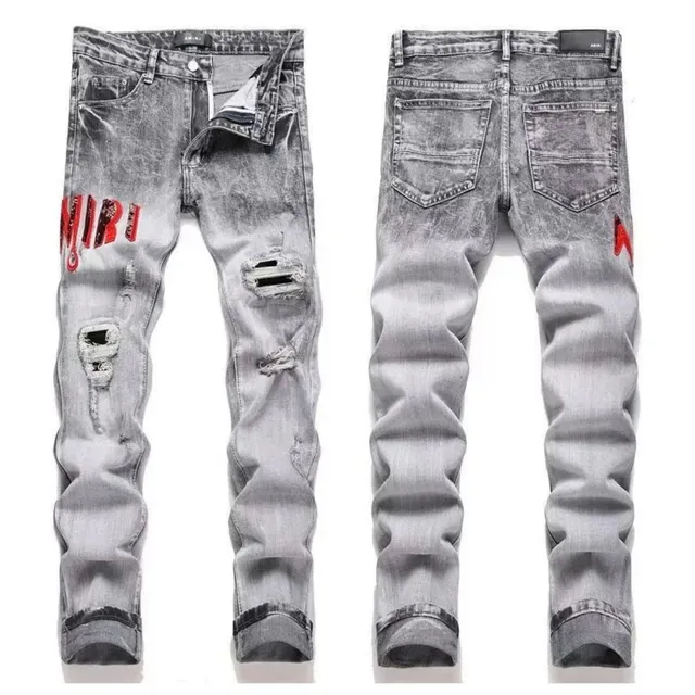 Amiri Distressed Jeans Red Logo Print