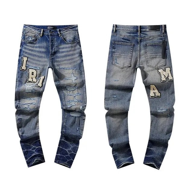 Amiri Distressed Patchwork Jeans IRMA Logo Appliqué