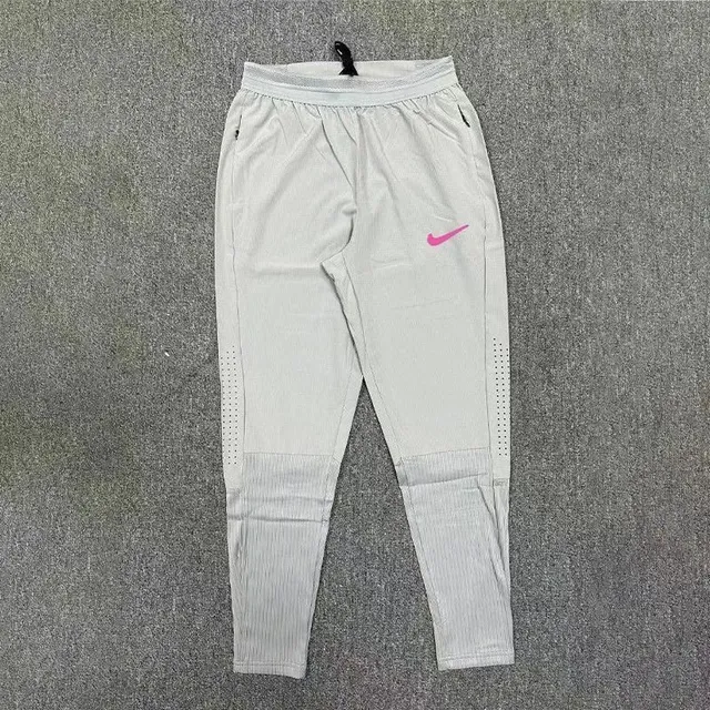 Nike Tech Fleece Joggers White with Pink Swoosh