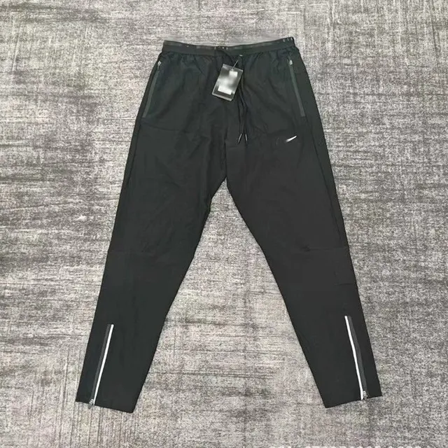 Nike Track Pants Reflective Zip Detail