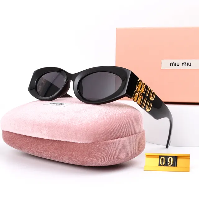 Miu Miu Oval Sunglasses Gold Logo Temples