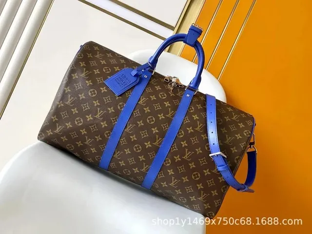 Louis Vuitton Keepall Monogram Canvas with Blue Leather Trim
