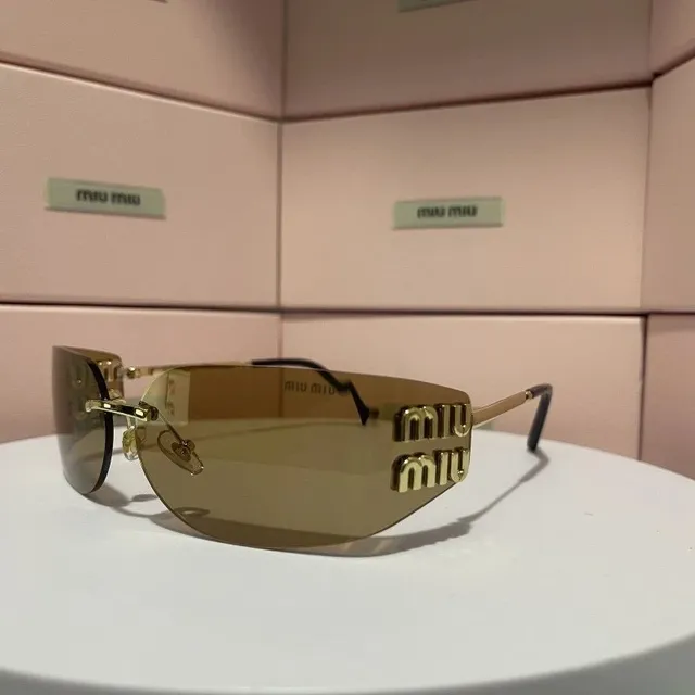 Miu Miu Shield Sunglasses Gold Logo