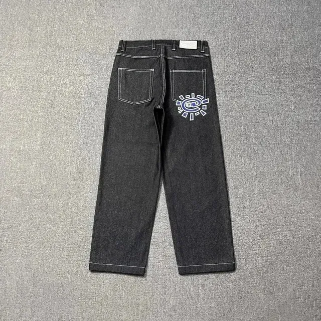 Corteiz Relaxed Fit Jeans Sun Logo Patch