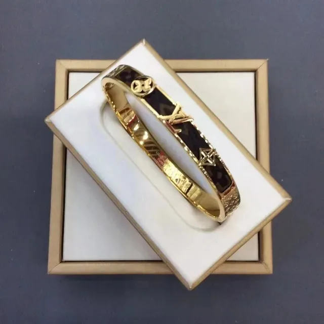 Louis Vuitton Bangle Monogram Coated Canvas