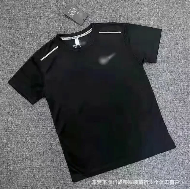 NK black short sleeved shirt