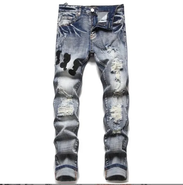 Amiri Distressed Jeans Mickey Mouse Patch