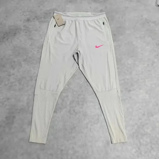 Nike Tech Fleece Joggers White with Pink Swoosh