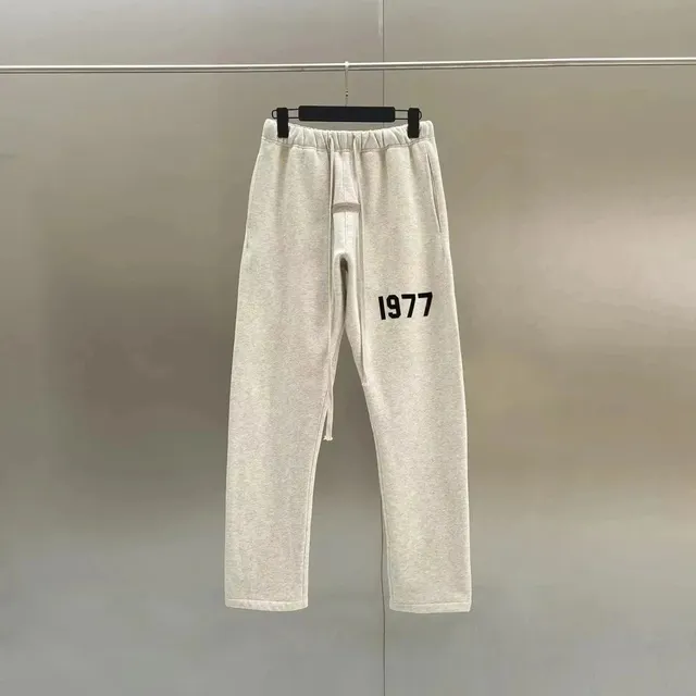Fear of God Essentials Sweatpants 1977 Print