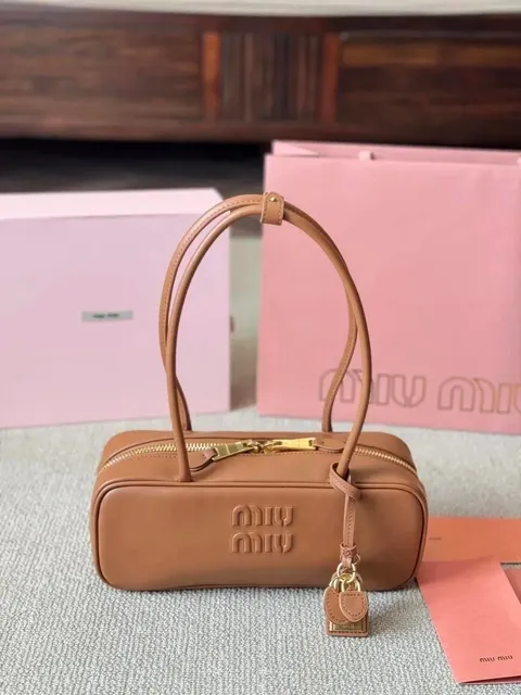 Miu Miu Cassette Embossed Logo