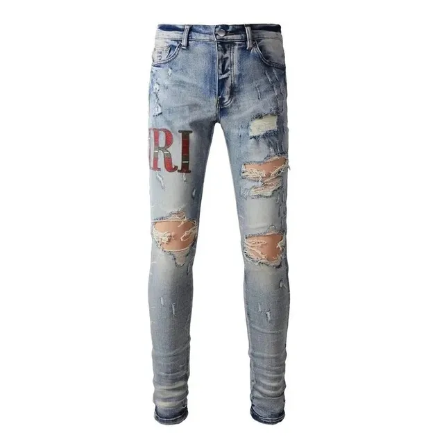 Amiri Distressed Slim Fit Jeans Logo Patch