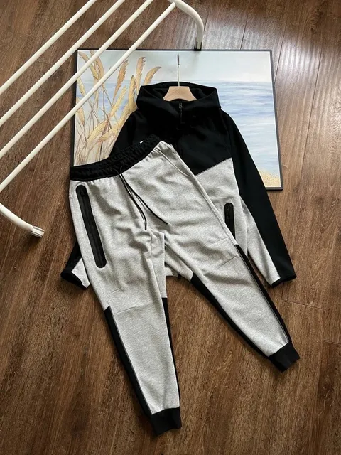 Black and light gray suit