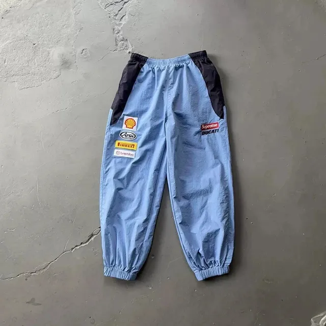 Supreme Track Pants Shell Logo Patch