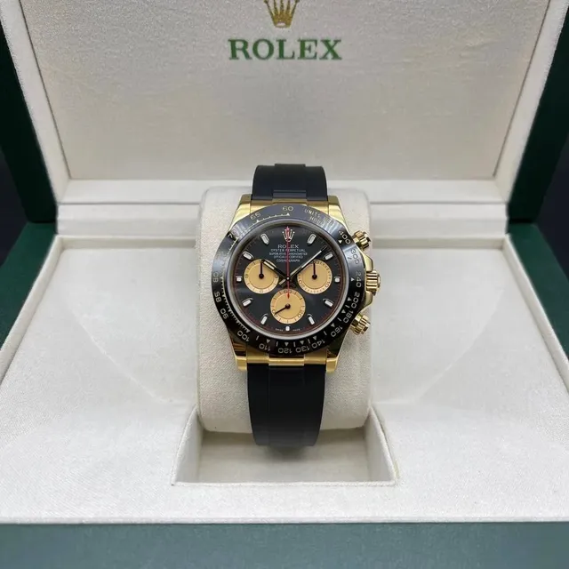 Rolex Oyster Perpetual Cosmograph Daytona Black Dial with Gold Subdials
