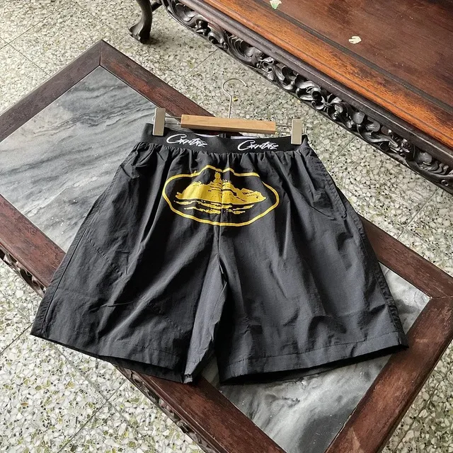 Comme des Garçons Box Logo Shorts
