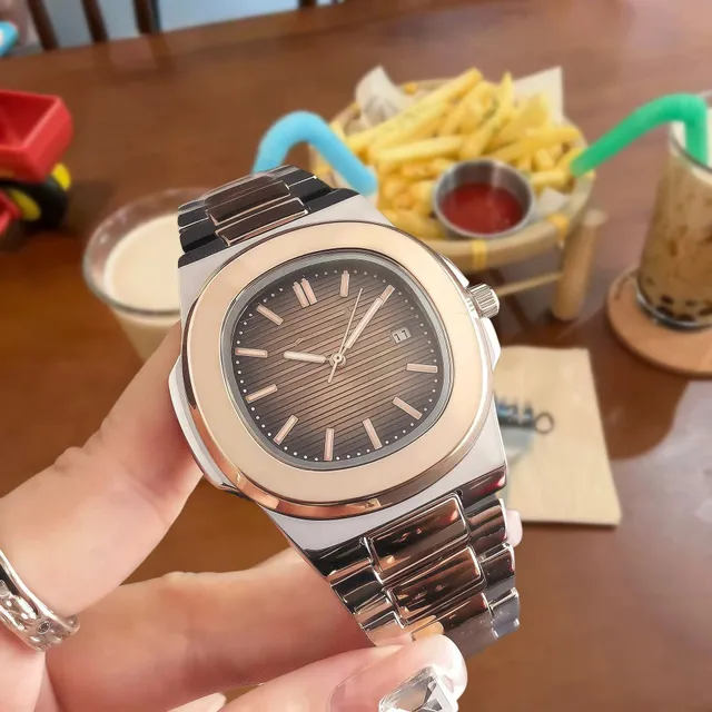 Patek Philippe Nautilus Oval Case with Horizontal Lines Dial