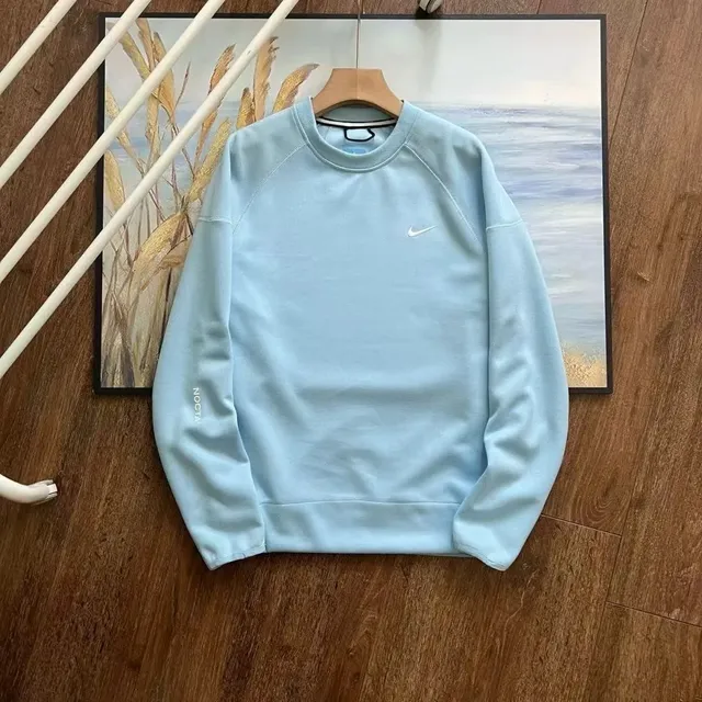 Nike × NOCTA Tech Fleece Crew Light Blue