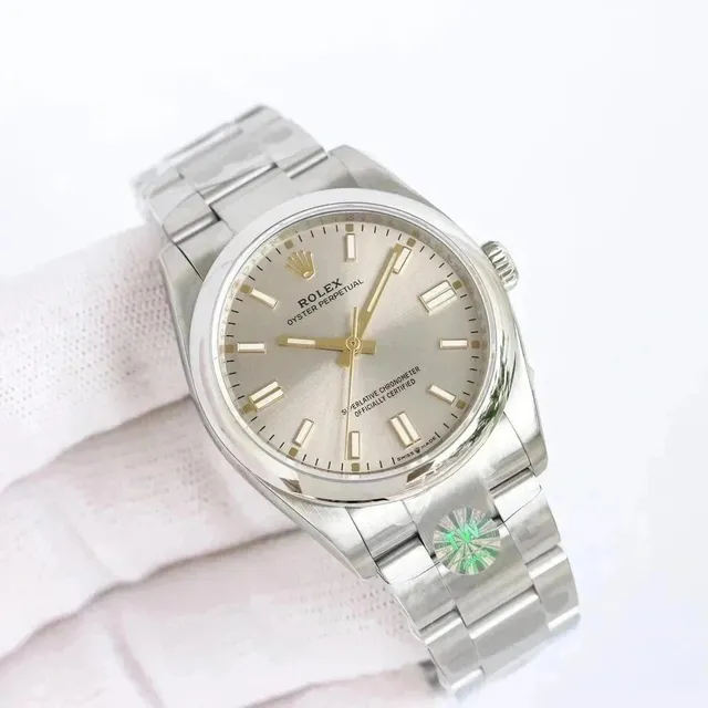 Rolex Oyster Perpetual Silver Dial with Gold Indices