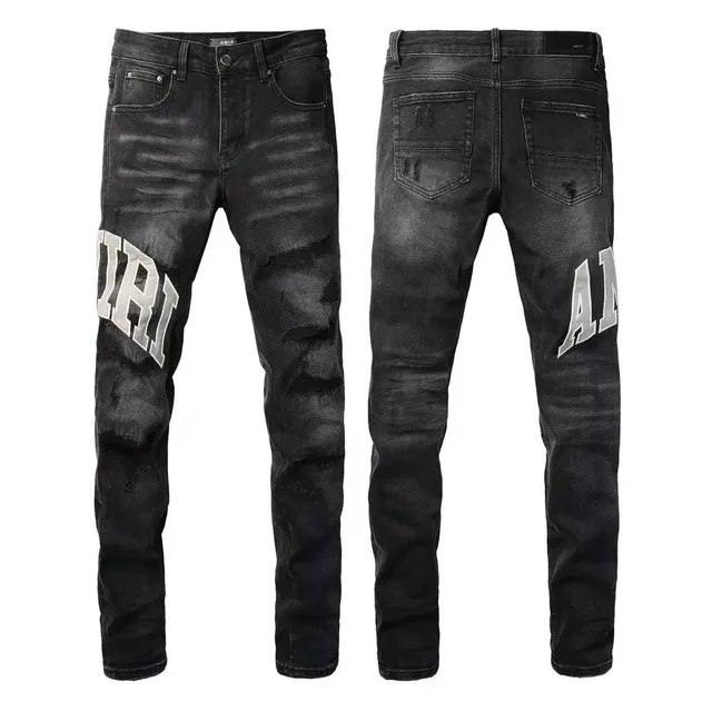 Amiri Distressed Logo Jeans