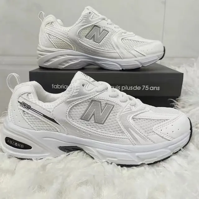 Nike New Balance 2002R Triple White