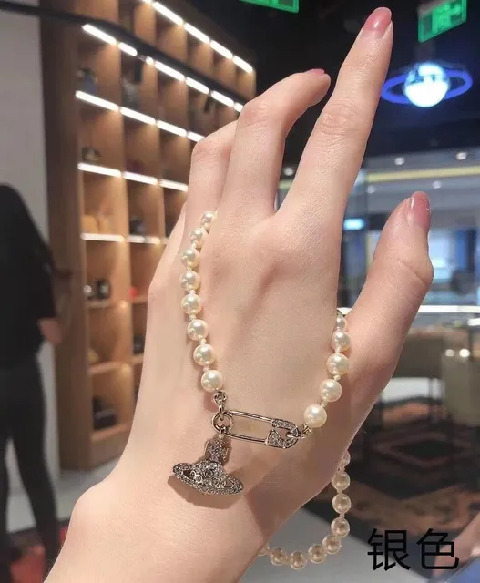 Vivienne Westwood Pearl Safety Pin Necklace Crystal Orb Pendant
