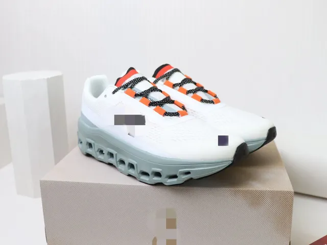 On Cloudmonster White Orange