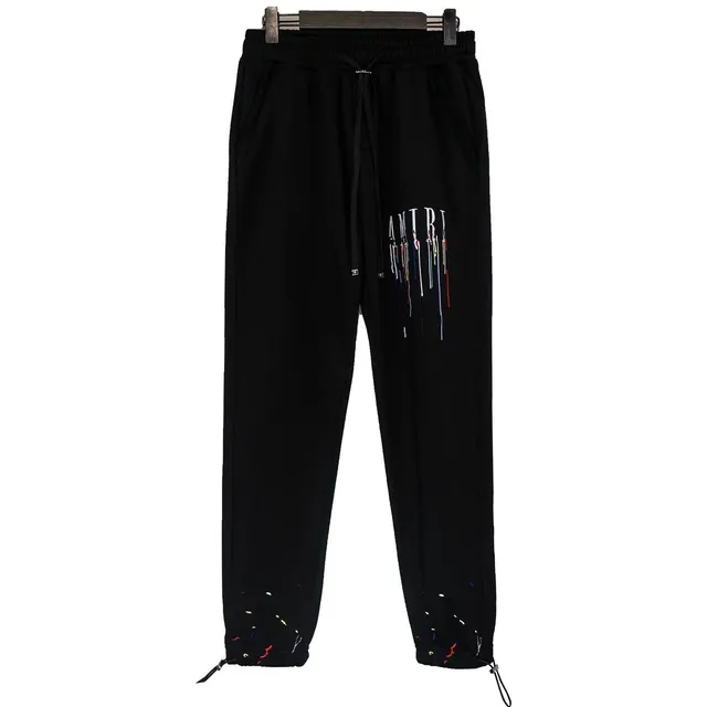 Amiri Track Pants Dripping Logo