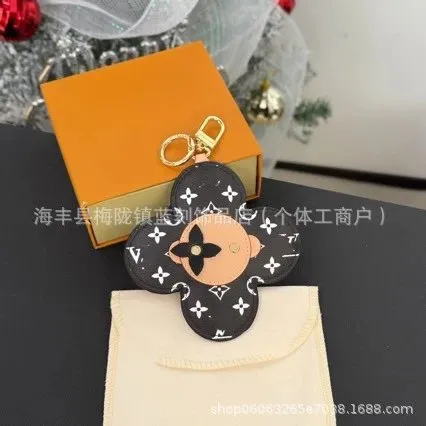 Louis Vuitton Monogram Flower Keyholder Black Monogram with Beige Leather