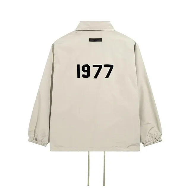 Fear of God Essentials Coaches Jacket 1977 Print