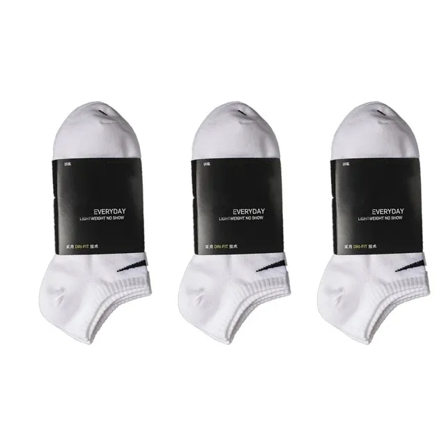 three pairs of white short
