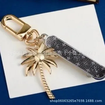 Louis Vuitton Palm Tree Keychain Metal Palm Charm with Stone Inlay Tag