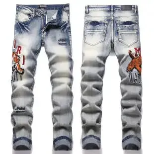 Amiri Distressed Slim Fit Jeans Tiger Print Patch