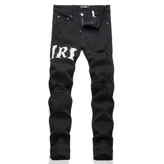 Amiri Distressed Jeans Logo Print