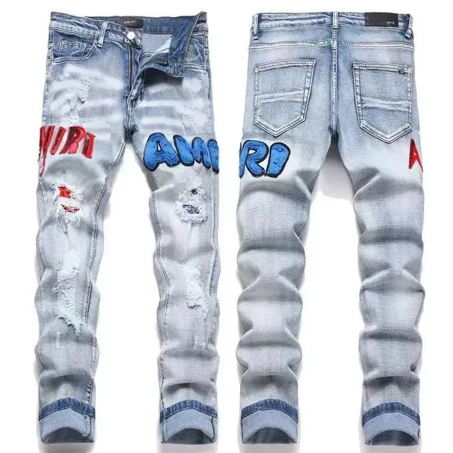 Distressed Logo Jeans Embroidered AMIRI