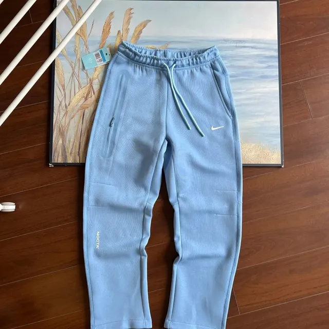 Nike × NOCTA Tech Fleece Joggers Light Blue