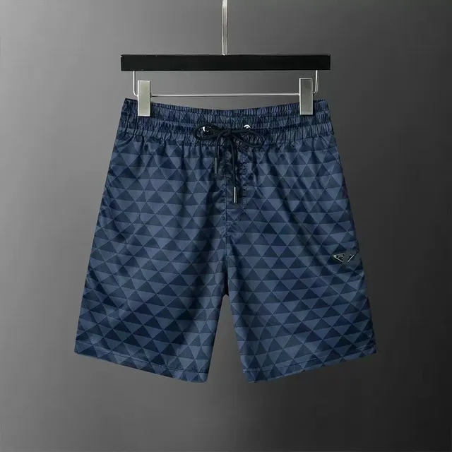 Prada Triangle-Print Shorts