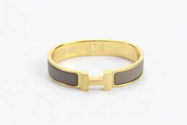 Hermès Clic H Bracelet Gold Tone with Grey Enamel